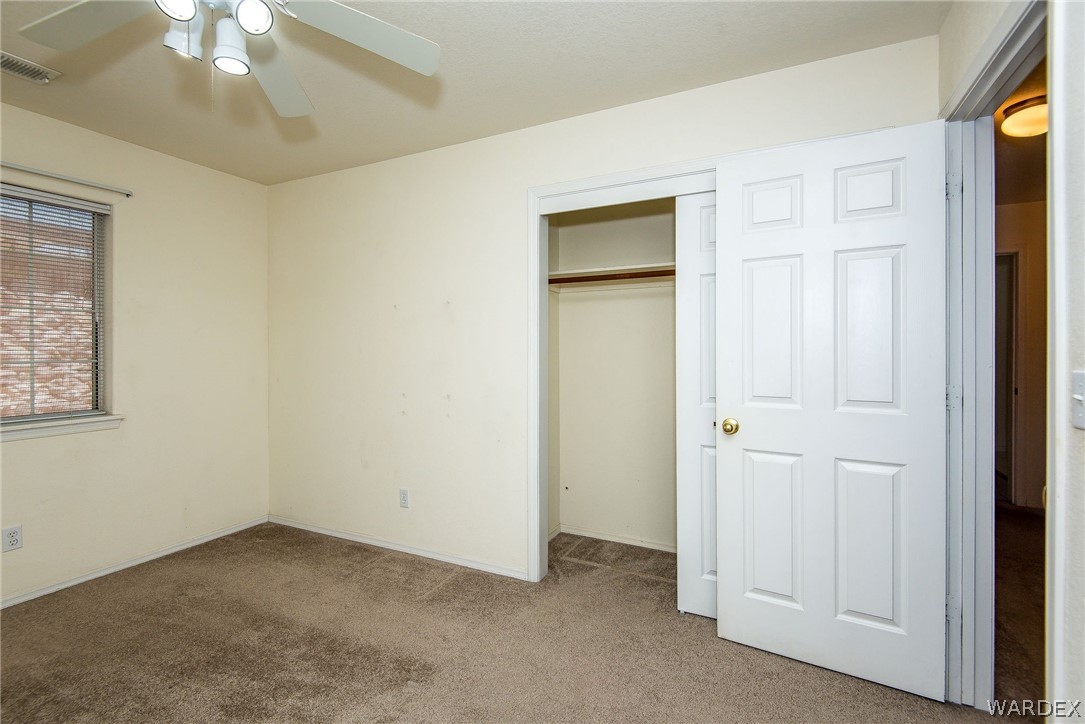 3395 Pegasus Ranch Lane Bullhead City, AZ 86429 - Photo 39 of 50 an empty room with a bathroom