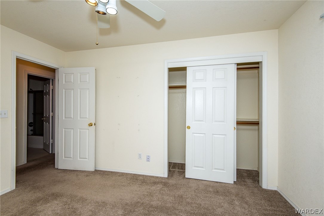 3395 Pegasus Ranch Lane Bullhead City, AZ 86429 - Photo 46 of 50 an empty room with a bathroom