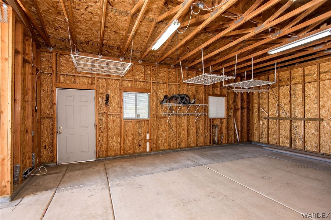 3395 Pegasus Ranch Lane Bullhead City, AZ 86429 - Photo 49 of 50 a view of a room with wooden walls