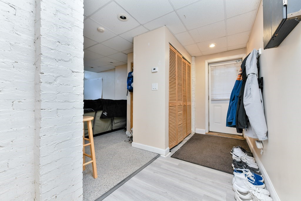748 East 3rd Street, Unit A Boston, MA 02127 - Photo 12 of 16 a view of walk in closet with clothes and shoes