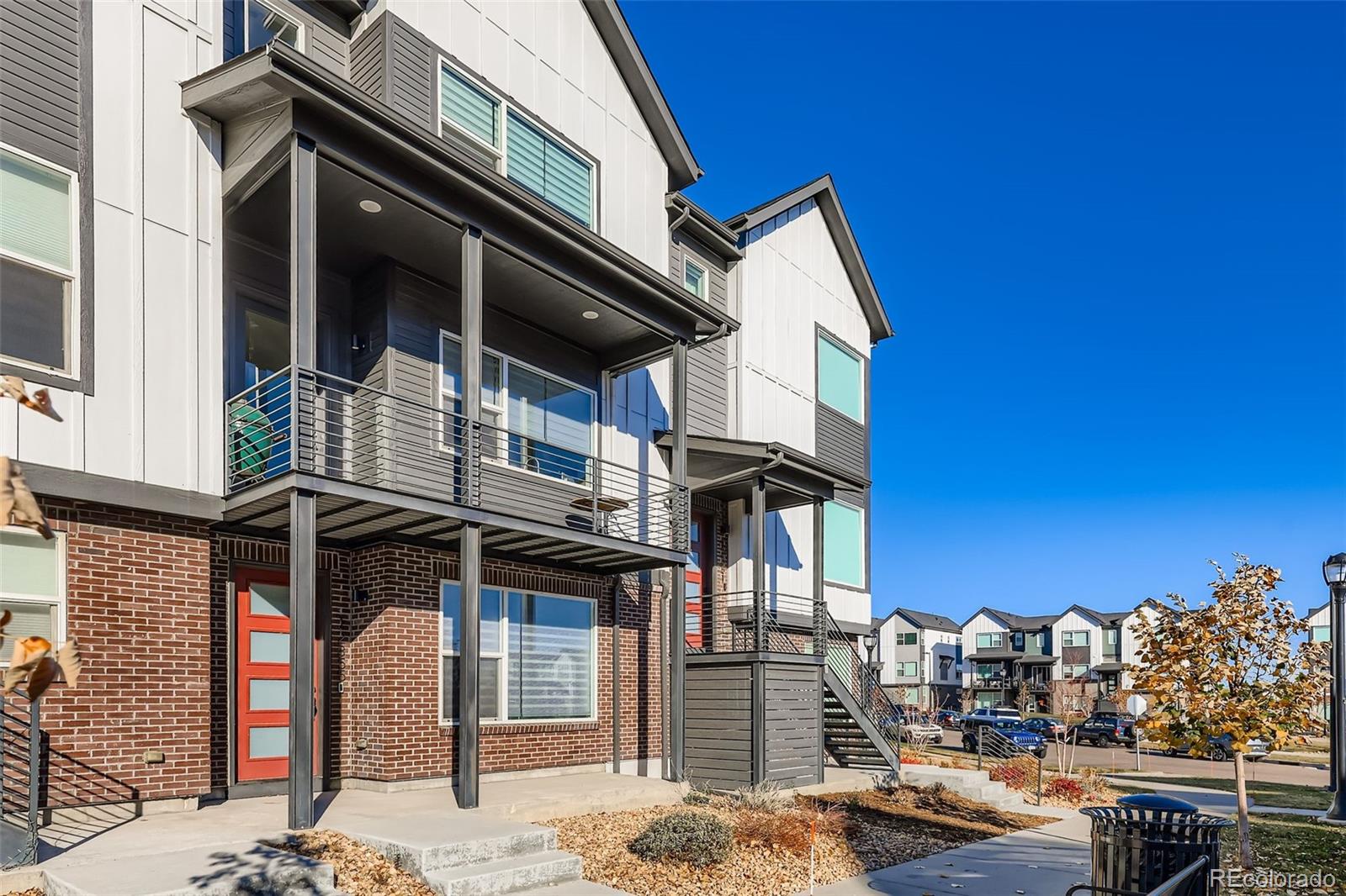 12355 West 51st Avenue Wheat Ridge, CO 80033 - Photo 1 of 17 a street sign on a pole on a street