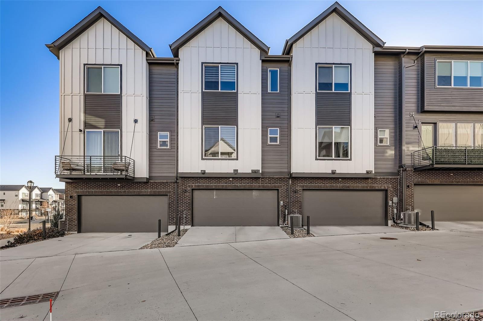 12355 West 51st Avenue Wheat Ridge, CO 80033 - Photo 17 of 17 a front view of a house with large windows