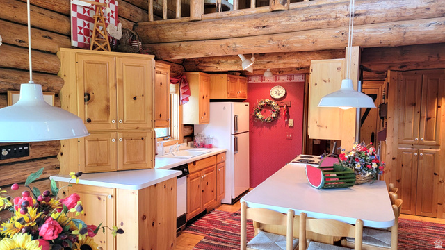 6210 Mountain View Road, Unit 133 Coalville, UT 84017 - Photo 26 of 87 Galley kitchen and breakfast bar.