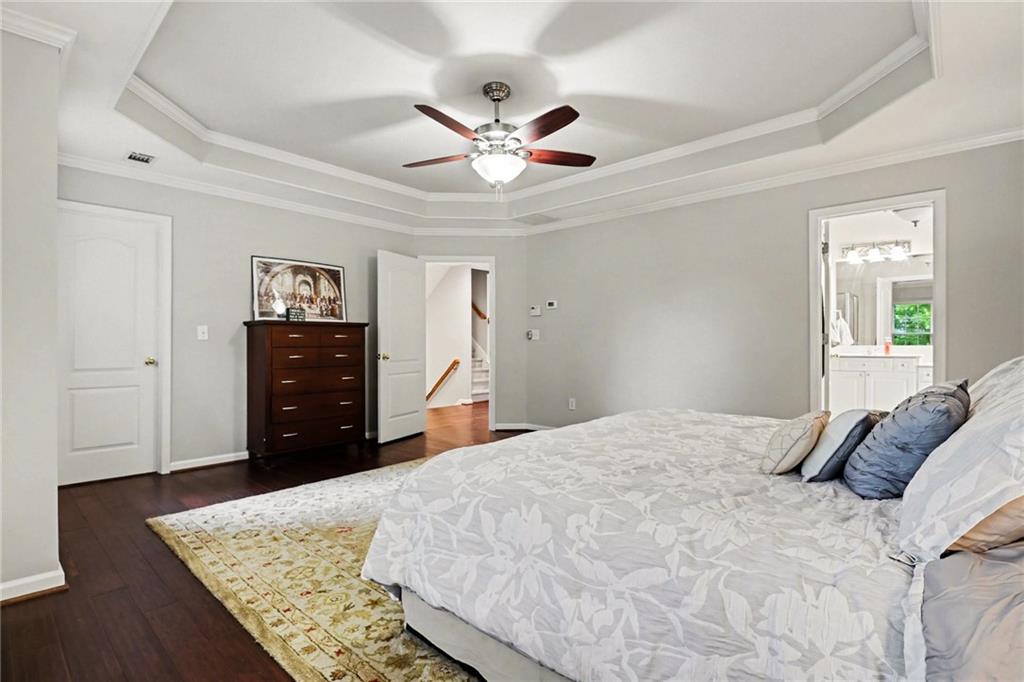 12552 Waterside Drive Alpharetta, GA 30004 - Photo 16 of 33 a bedroom with a bed and a dresser
