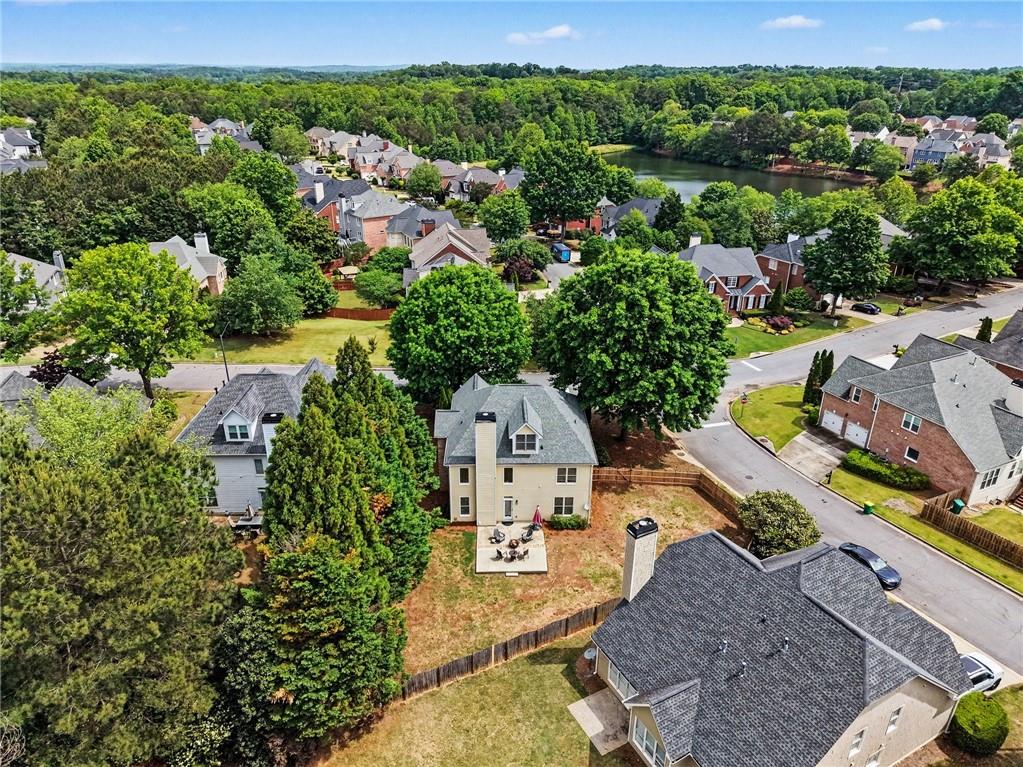 12552 Waterside Drive Alpharetta, GA 30004 - Photo 28 of 33 an aerial view of a house with a yard