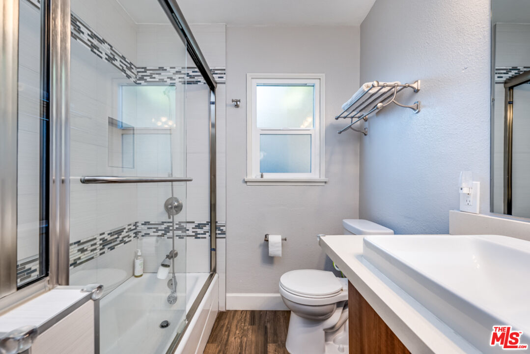 3330 Hermanos Street Pasadena, CA 91107 - Photo 21 of 40 a bathroom with a sink toilet and shower