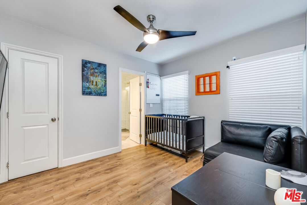 3330 Hermanos Street Pasadena, CA 91107 - Photo 22 of 40 a bedroom with furniture and a window