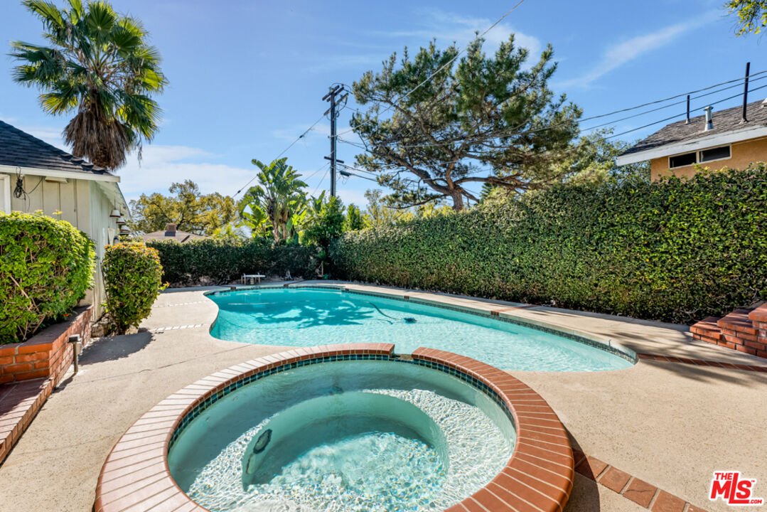 3330 Hermanos Street Pasadena, CA 91107 - Photo 28 of 40 a small pool with trees in the background