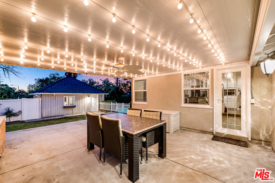3330 Hermanos Street Pasadena, CA 91107 - Photo 34 of 40 a view of a patio with a table and chairs