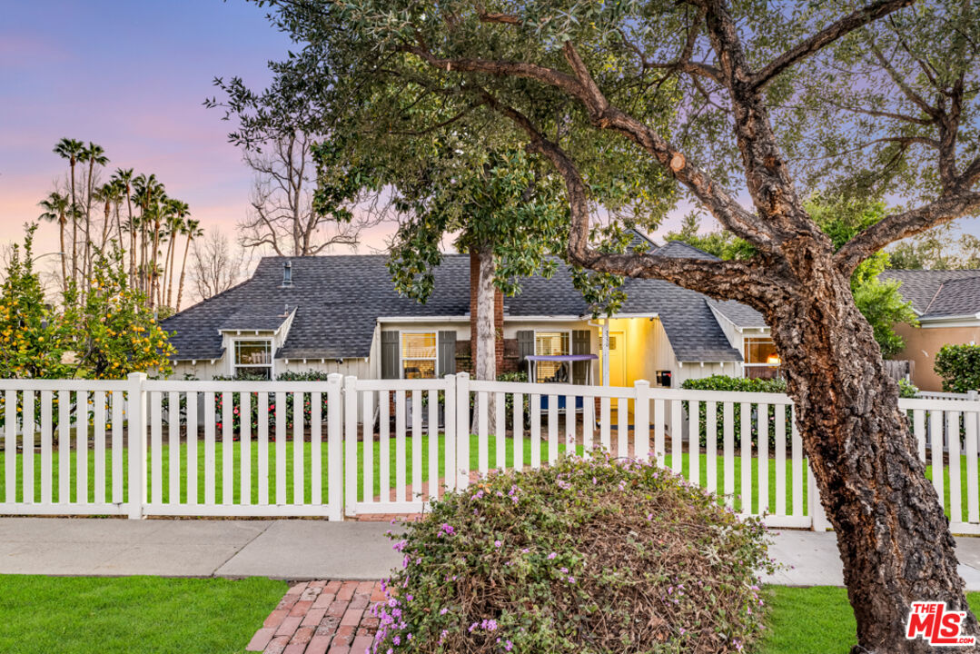 3330 Hermanos Street Pasadena, CA 91107 - Photo 4 of 40 a front view of a house with a garden