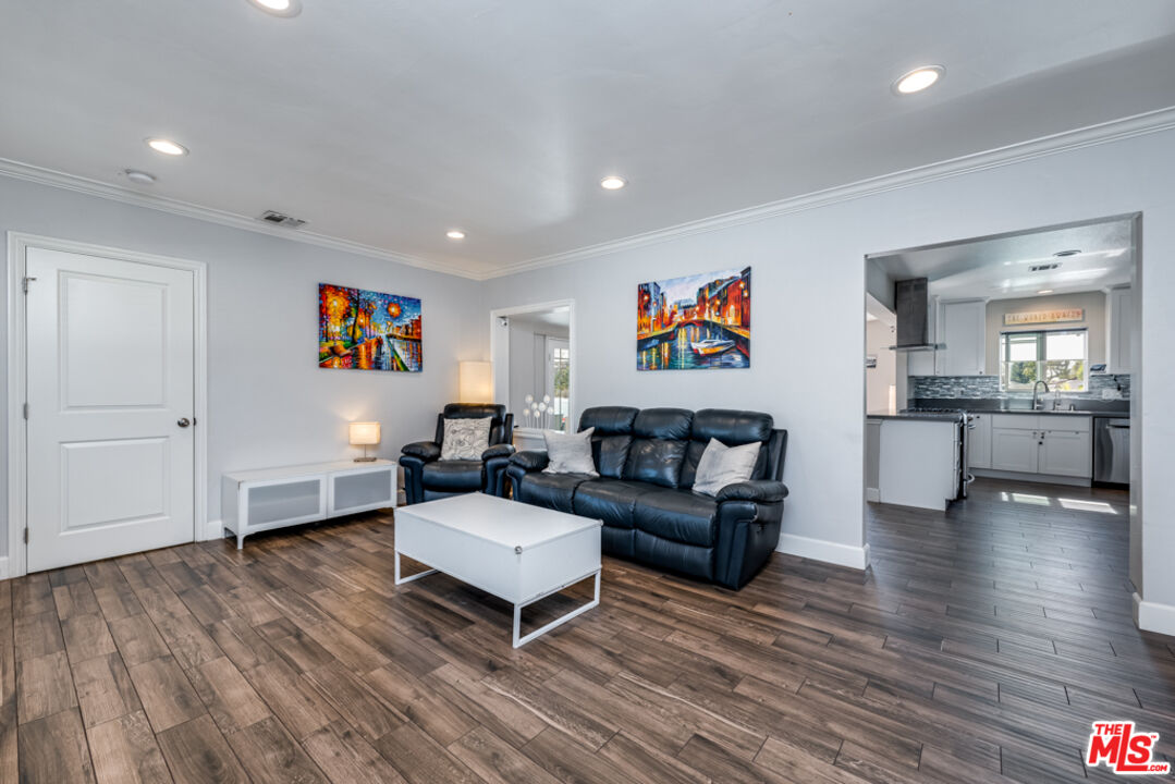 3330 Hermanos Street Pasadena, CA 91107 - Photo 7 of 40 a living room with furniture and a wooden floor