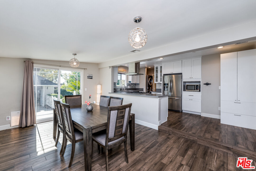 3330 Hermanos Street Pasadena, CA 91107 - Photo 10 of 40 a view of a dining room with furniture and wooden floor
