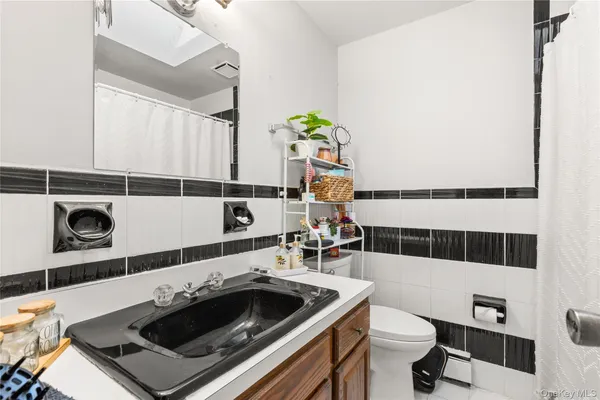 a kitchen with a stove and a sink
