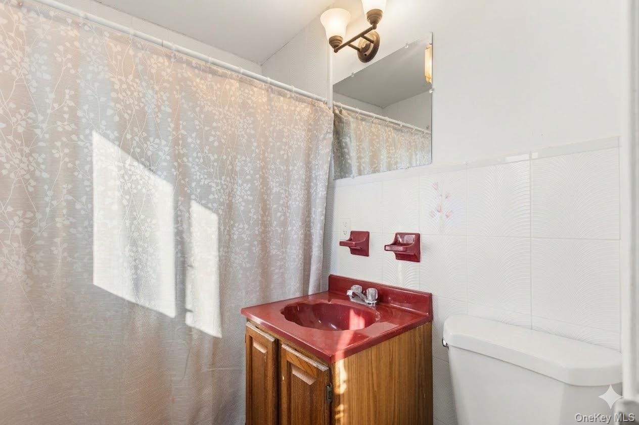 809 Canal Street Lindenhurst, NY 11757 - Photo 21 of 25 Virtually Staged and Enhanced