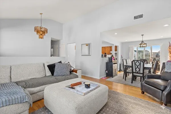 a living room with furniture and a table