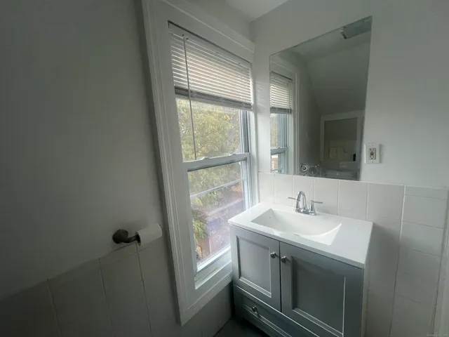 a bathroom with a sink and a vanity