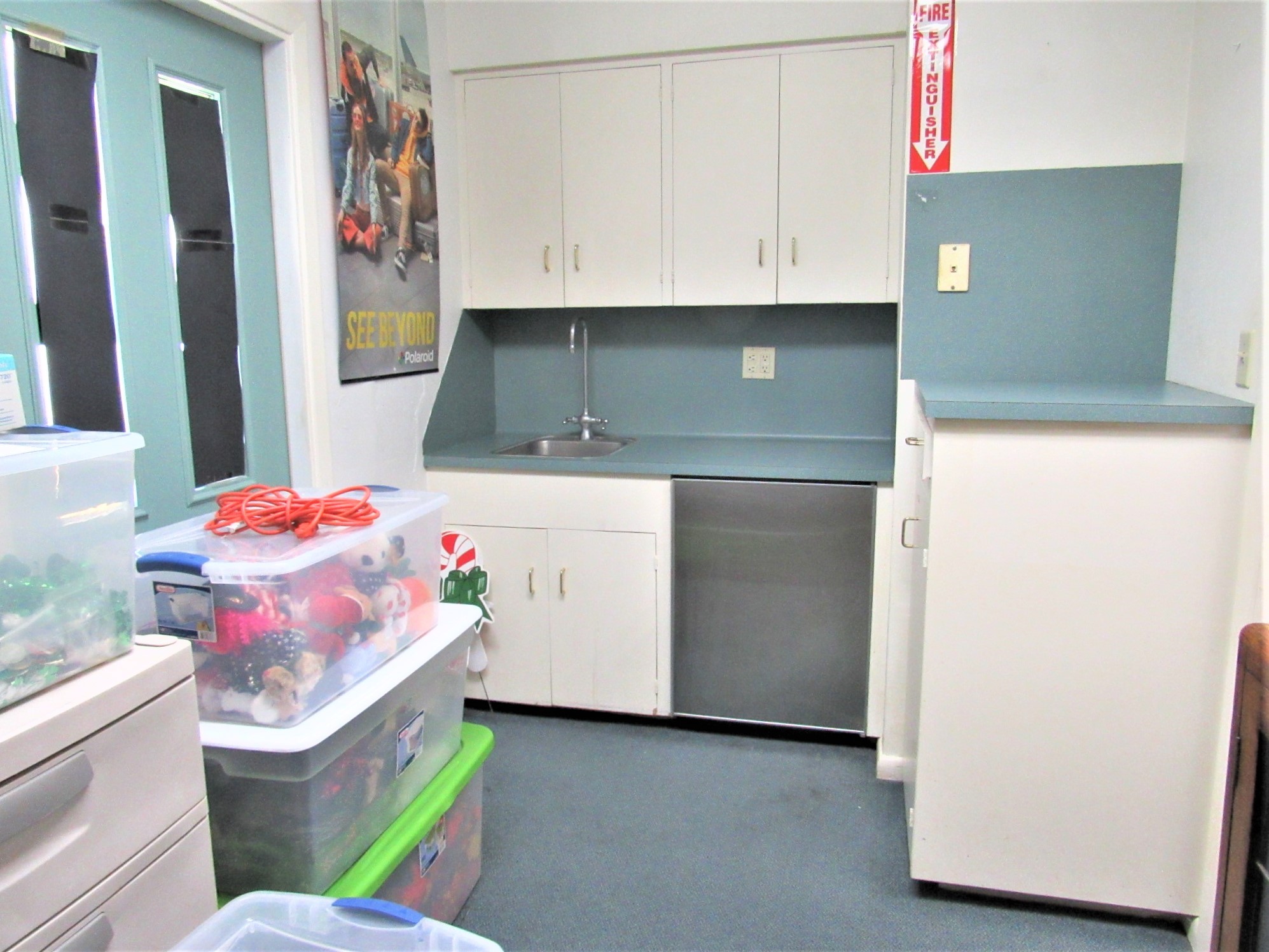 1116 North Fulton Street Wharton, TX 77488 - Photo 15 of 45 a utility room with cabinets washer and dryer