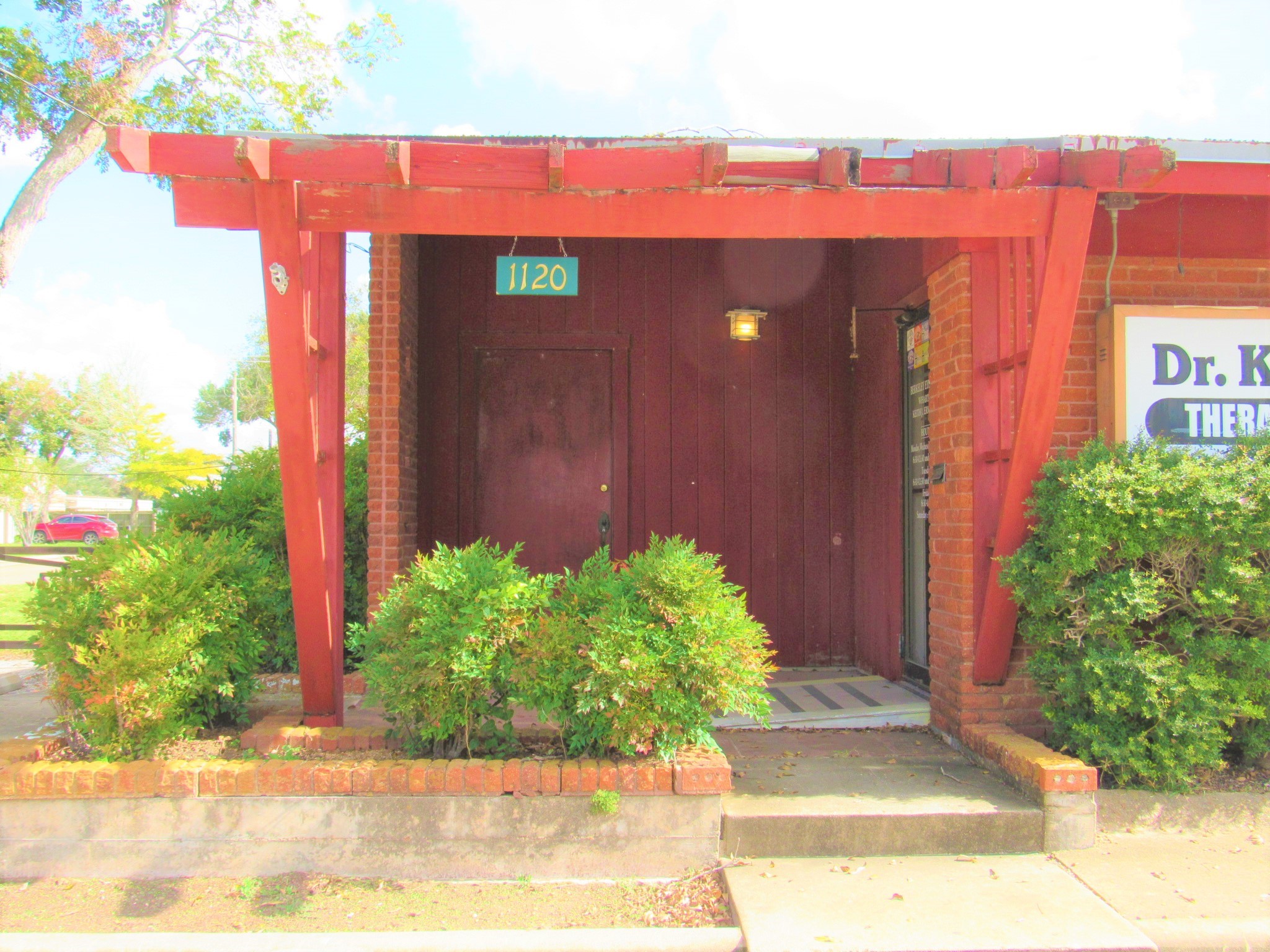 1116 North Fulton Street Wharton, TX 77488 - Photo 33 of 45 a front view of a house with garden