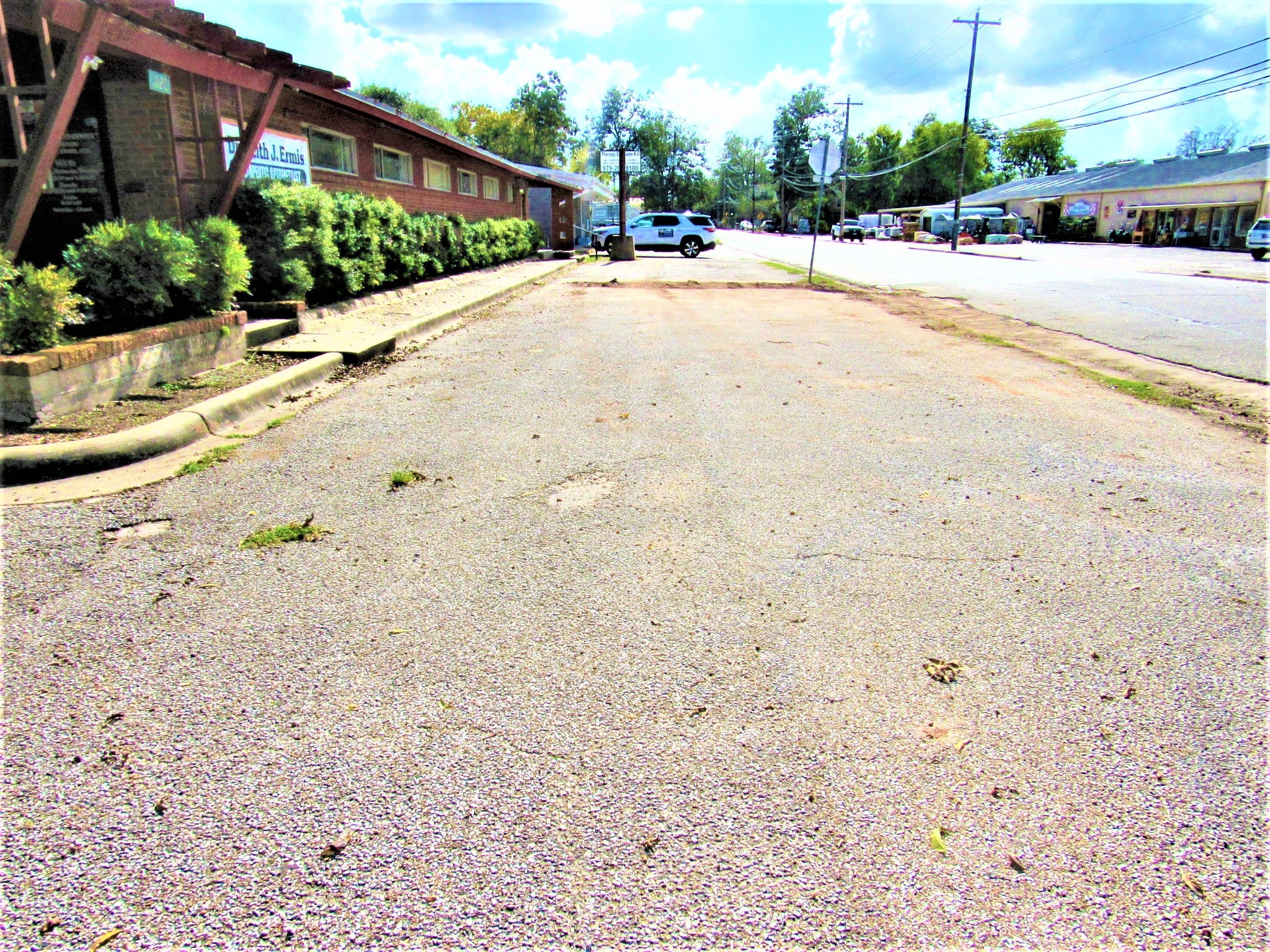 1116 North Fulton Street Wharton, TX 77488 - Photo 39 of 45 a street view with wooden fence