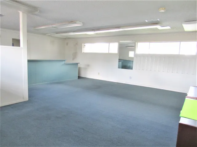 a room with toys and wooden floor