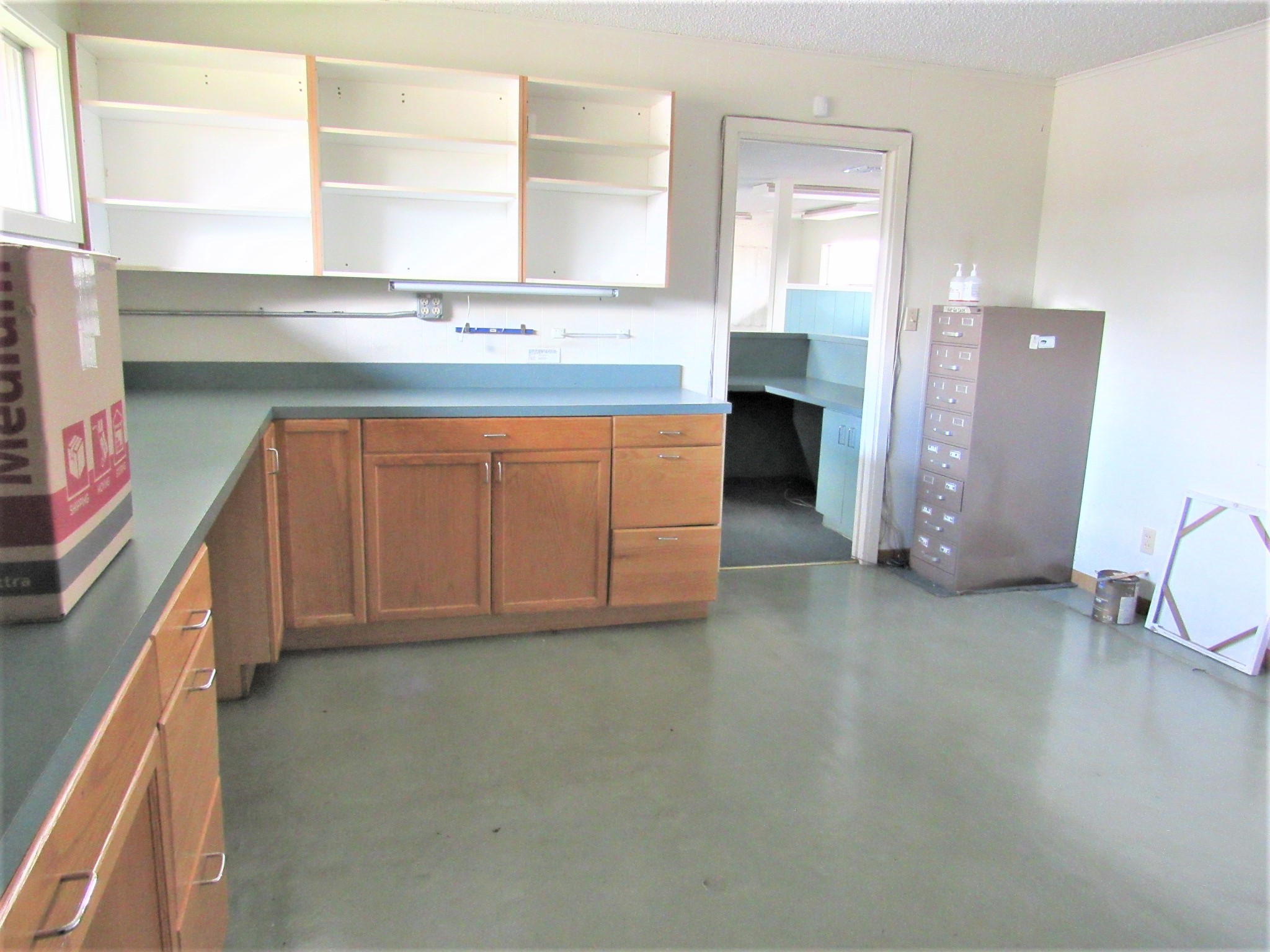 1116 North Fulton Street Wharton, TX 77488 - Photo 9 of 45 a view of a kitchen with a sink and cabinets