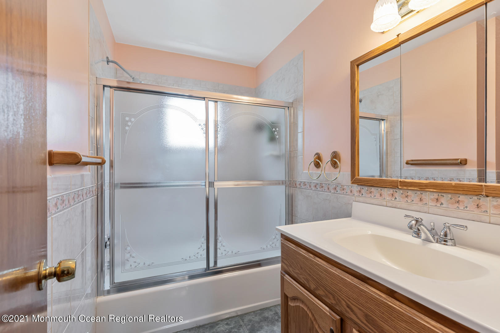 210 Middle Road Hazlet, NJ 07730 - Photo 15 of 30 a bathroom with a sink and a mirror