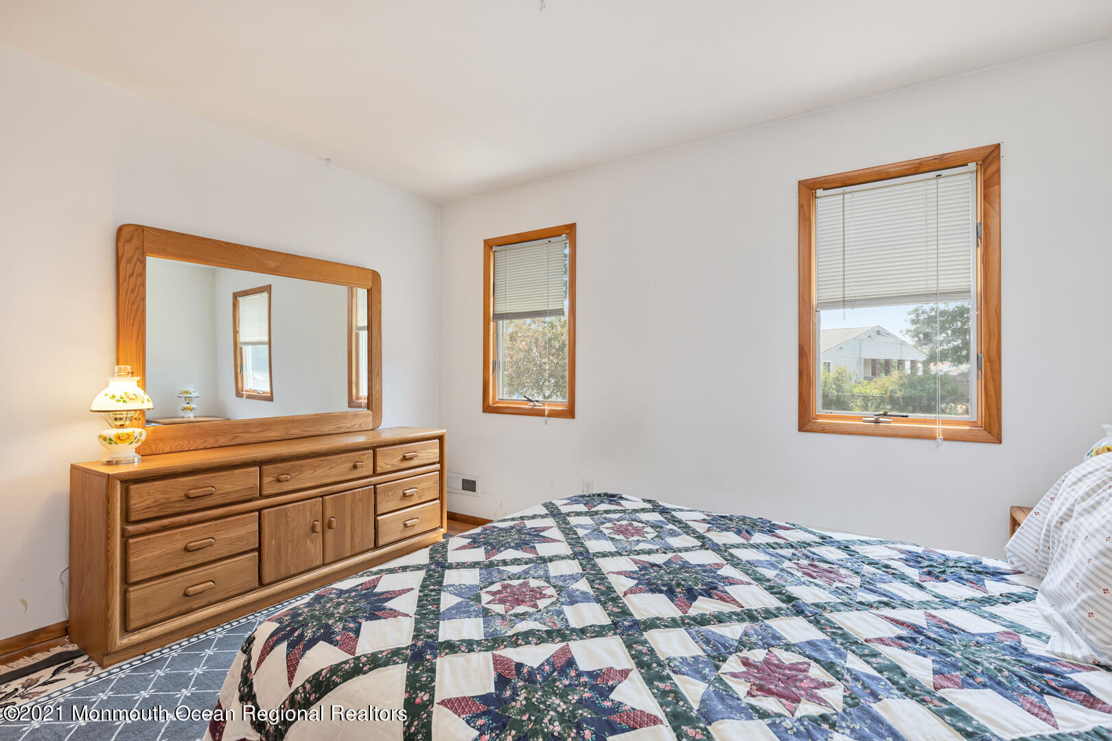 210 Middle Road Hazlet, NJ 07730 - Photo 17 of 30 a bedroom with a bed and a dresser in it