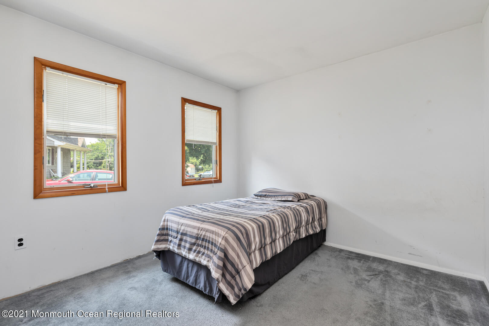 210 Middle Road Hazlet, NJ 07730 - Photo 21 of 30 a bedroom with a bed next to a window