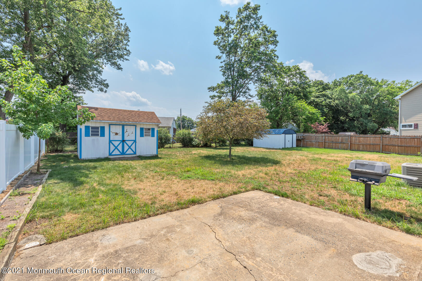 210 Middle Road Hazlet, NJ 07730 - Photo 27 of 30 a view of a house with backyard and sitting area