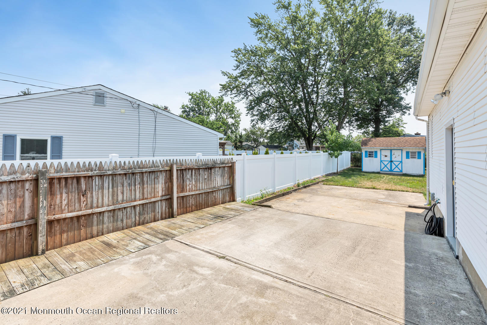 210 Middle Road Hazlet, NJ 07730 - Photo 5 of 30 a view of a house with a backyard and a balcony