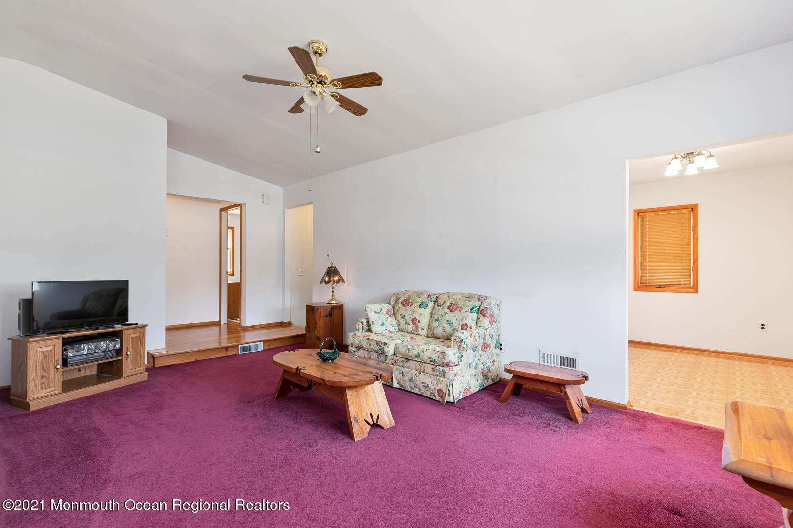 210 Middle Road Hazlet, NJ 07730 - Photo 7 of 30 a living room with furniture and a flat screen tv