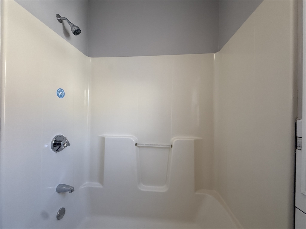 703 Mill Street Marion, MA 02738 - Photo 11 of 20 a bathroom with a shower