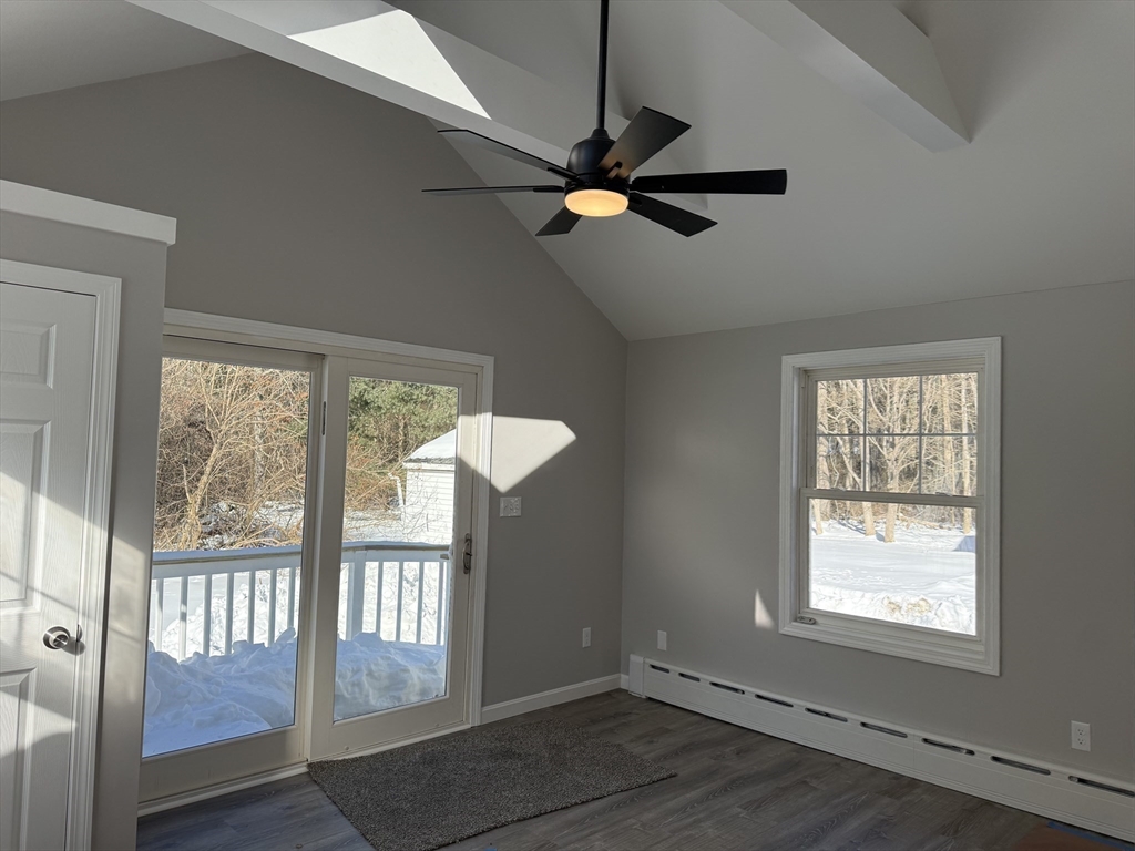 703 Mill Street Marion, MA 02738 - Photo 17 of 20 wooden floor in an empty room with a window