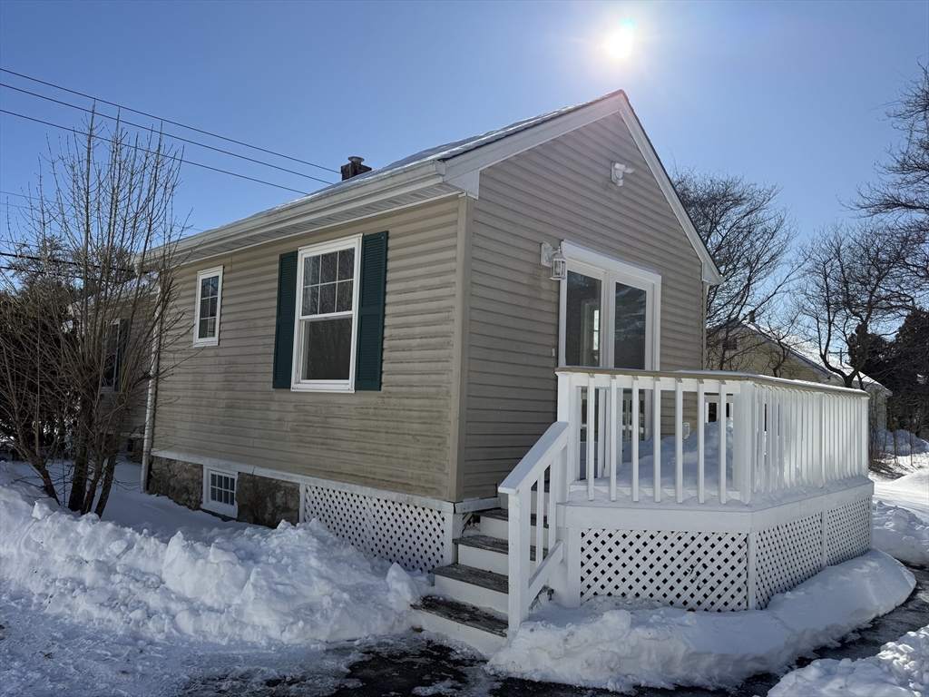 703 Mill Street Marion, MA 02738 - Photo 5 of 20 a view of a house with a yard