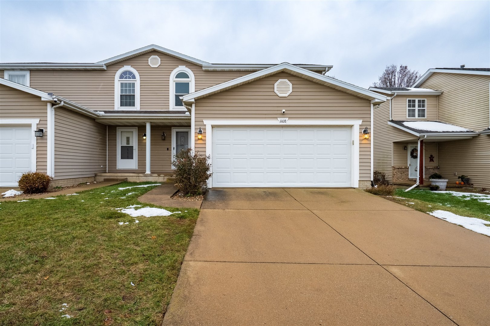 1108 Henry Street Normal, IL 61761 - Photo 1 of 1 a front view of a house with a yard and garage