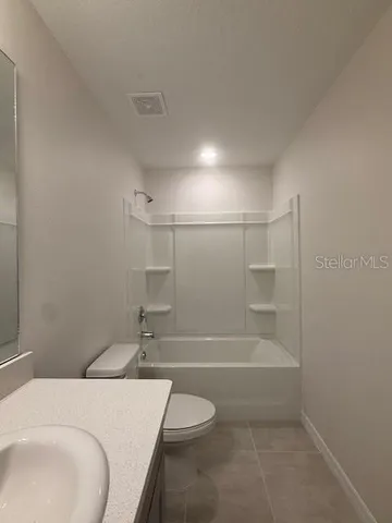 wooden floor and closet in a room