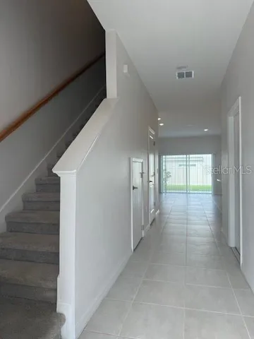 a view of hallway with stairs