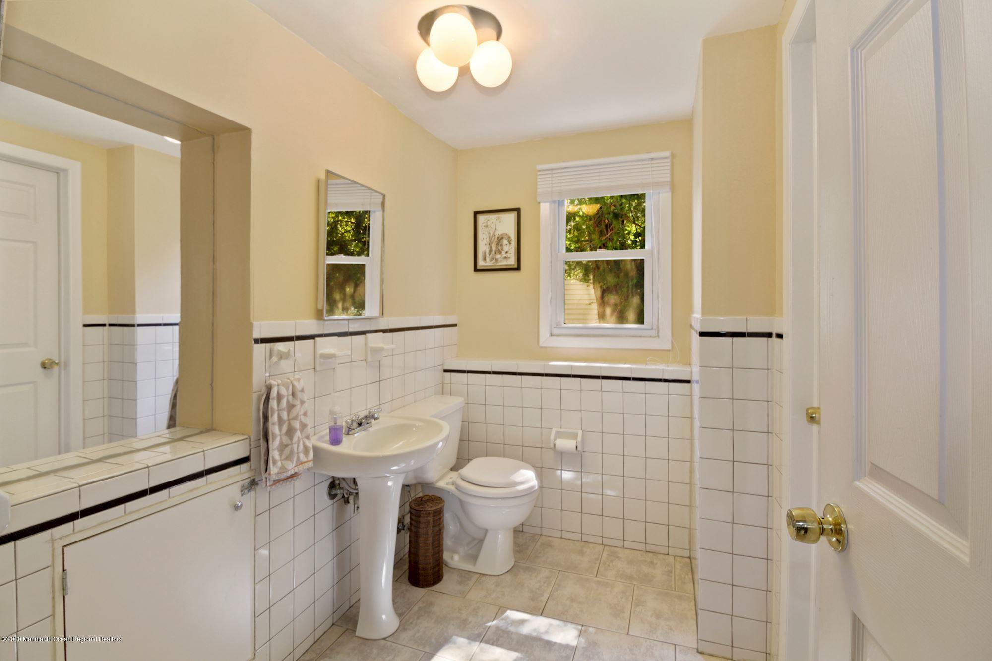 135 Valley Road River Edge, NJ 07661 - Photo 25 of 32 FAM RM HALF BATH OFF LAUNDRY jpg