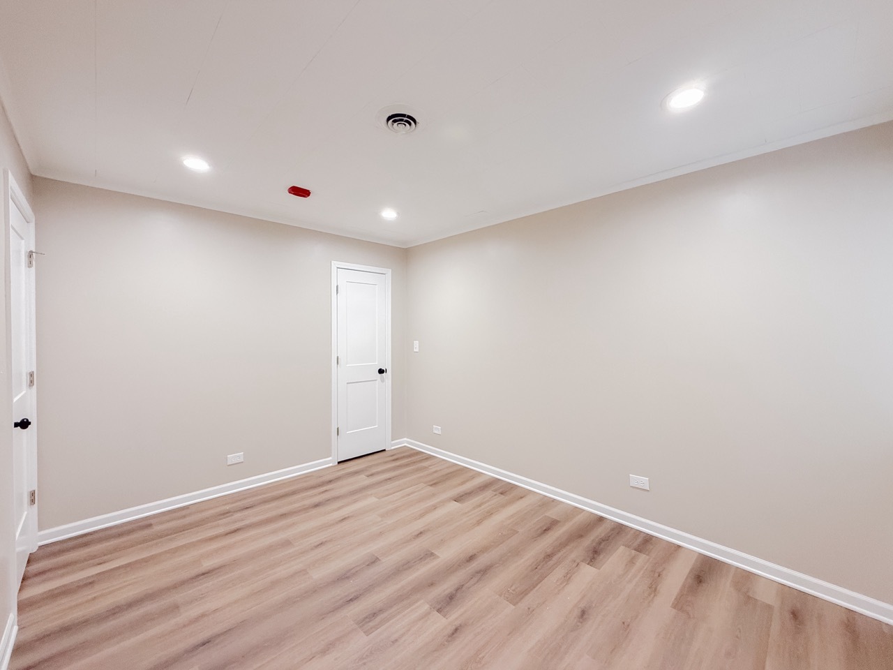106 East State Road, Unit 2B Island Lake, IL 60042 - Photo 15 of 18 a view of room with wooden floor