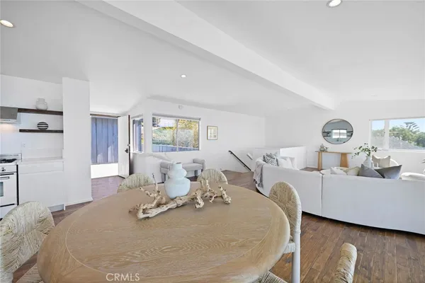 a bed room with a bed and a chair