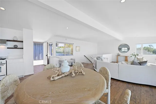 a bed room with a bed and a chair