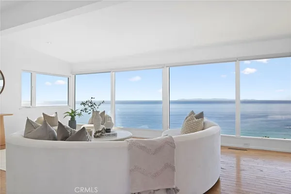 a living room with furniture and window