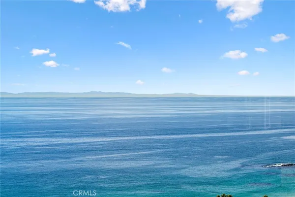 a view of an ocean beach and an outdoor space