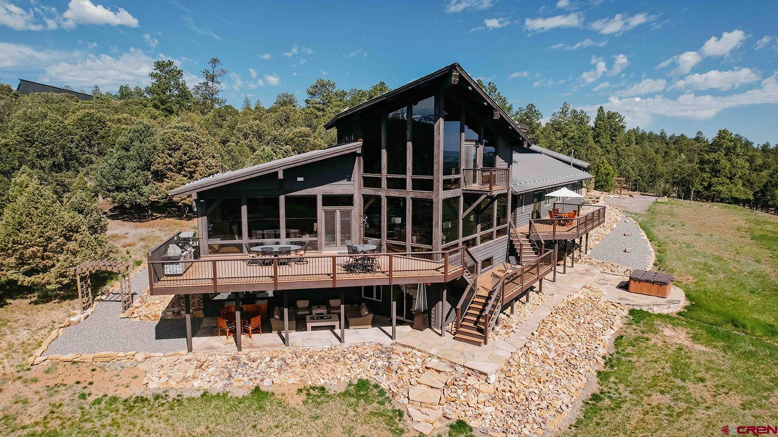 2118 Silverhorn Trail Ridgway, CO 81432 - Photo 1 of 35 a view of house with outdoor seating space