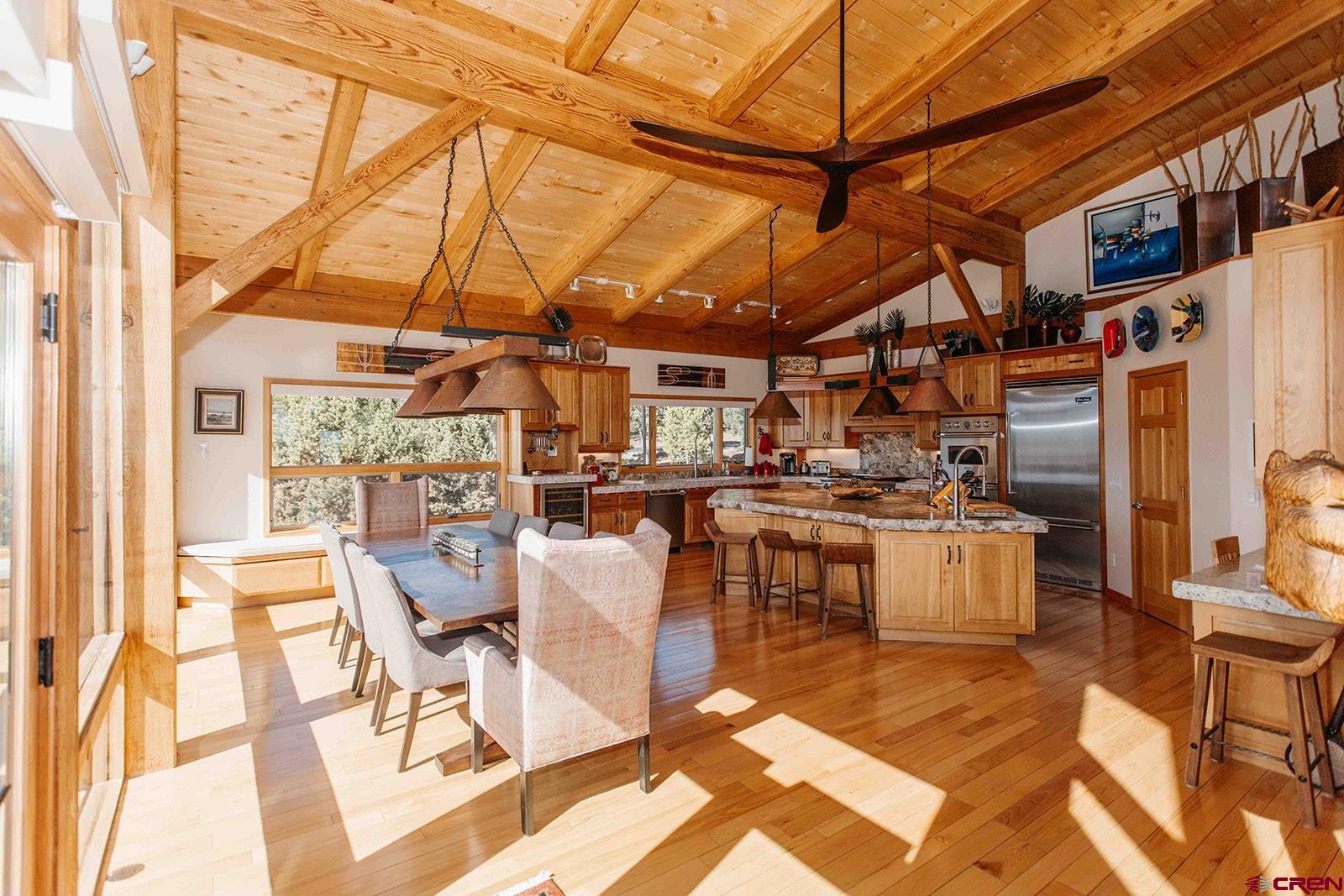 2118 Silverhorn Trail Ridgway, CO 81432 - Photo 11 of 35 a dining room with lots of tables and chairs