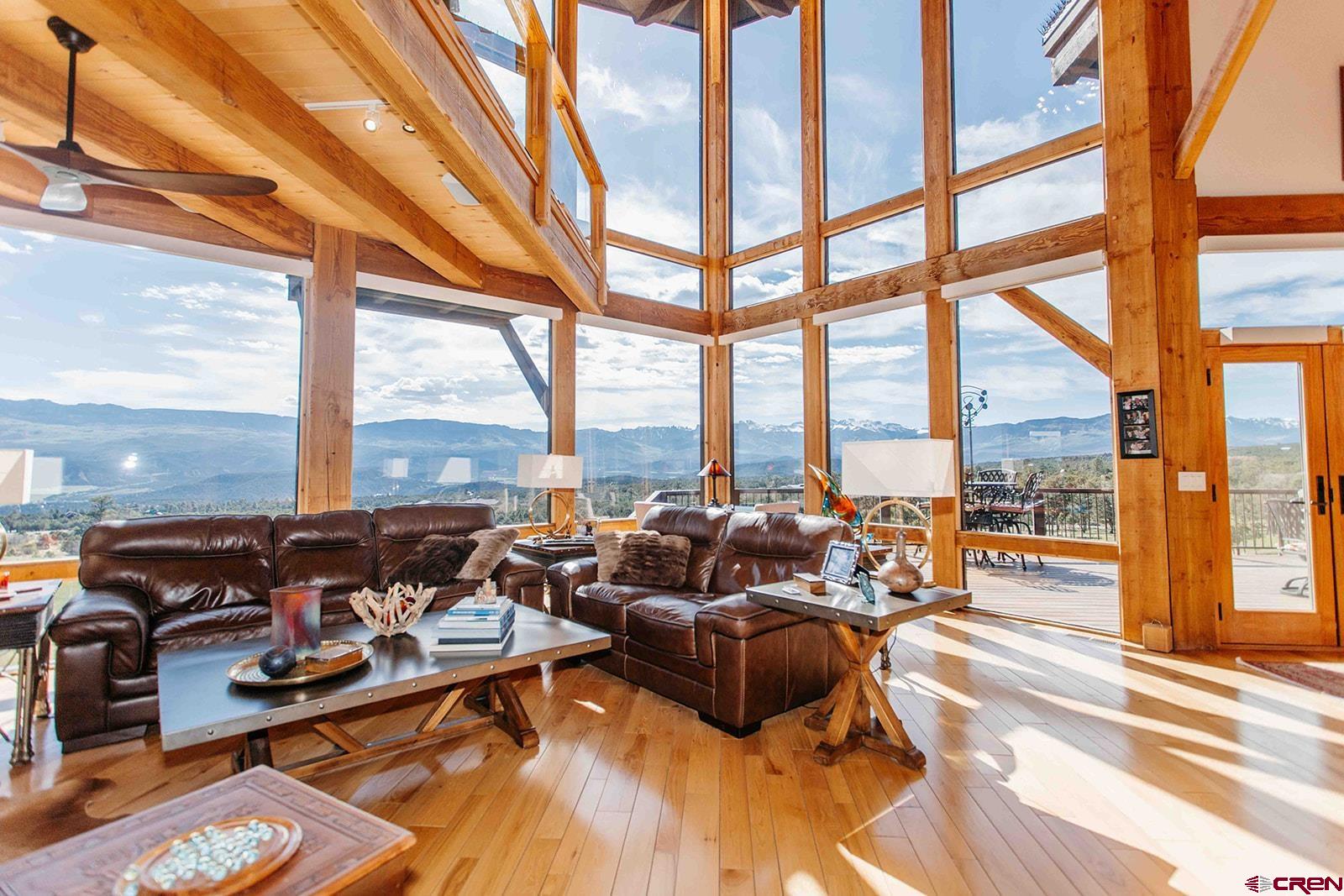 2118 Silverhorn Trail Ridgway, CO 81432 - Photo 2 of 35 a living room with furniture city view and large windows