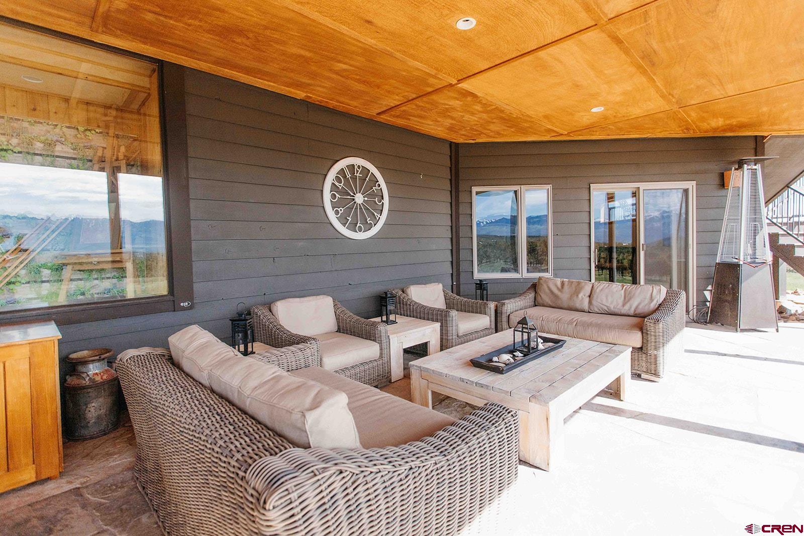 2118 Silverhorn Trail Ridgway, CO 81432 - Photo 29 of 35 a living room with furniture a window and a table
