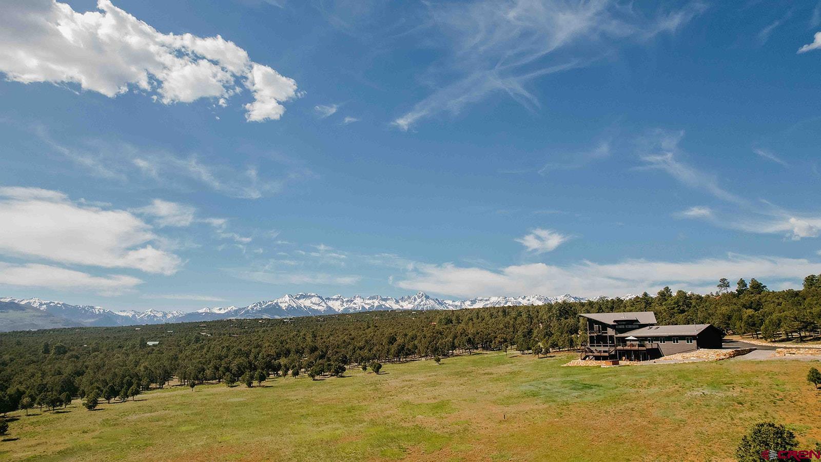 2118 Silverhorn Trail Ridgway, CO 81432 - Photo 7 of 35 a view of a lake with a mountain in the background