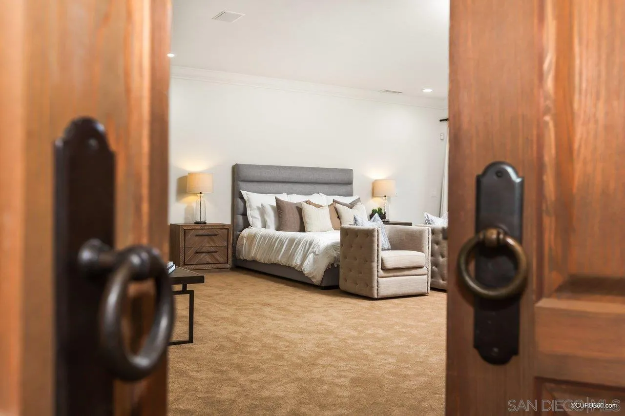 5530 Codorniz Rancho Santa Fe, CA 92067 - Photo 13 of 37 a bedroom with furniture and a flat screen tv