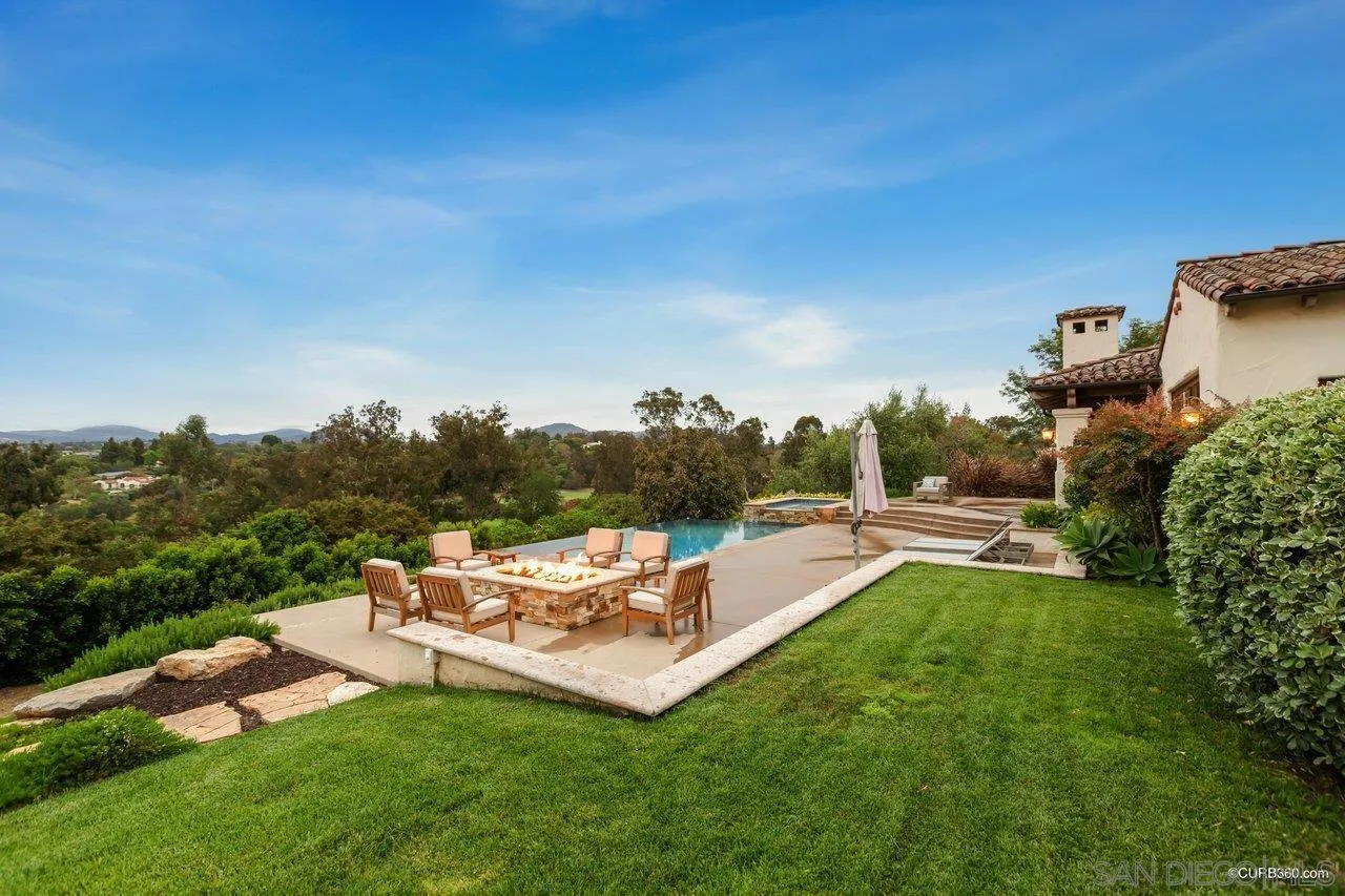 5530 Codorniz Rancho Santa Fe, CA 92067 - Photo 28 of 37 a view of a house with a yard porch and sitting area